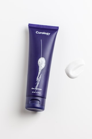 Organic face cream product photo with a crisp colorful backdrop